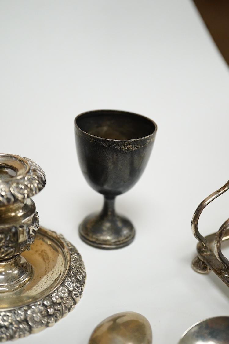 A collection of small silver, to include a late Victorian seven bar toast rack, by Edward Gilbert, London, 1887, length 13.3cm, a late Victorian bowl, pair of shell salts, nut dish, egg cup, Georgian chamberstick(part of